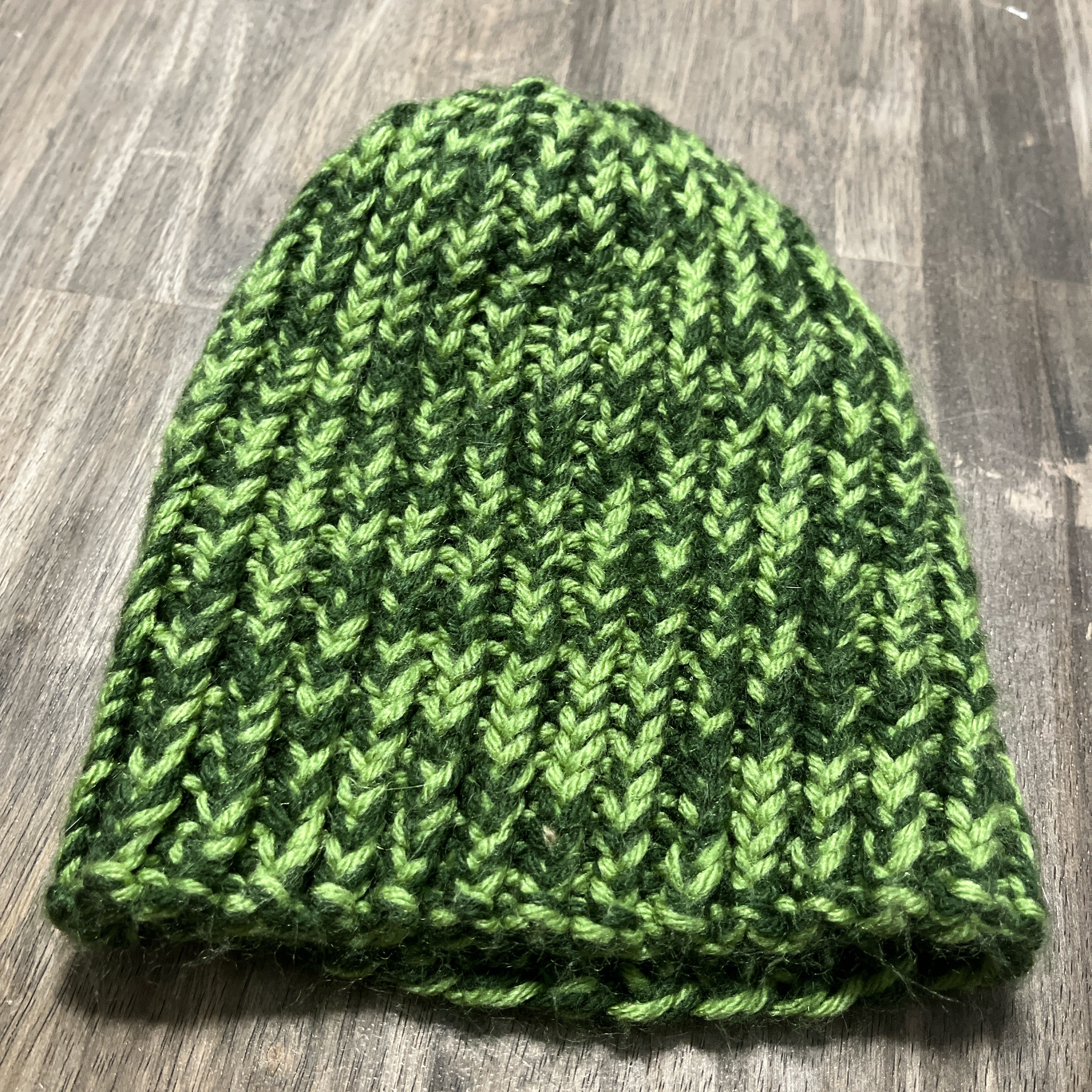 Brimless light green and green knitted beanie
